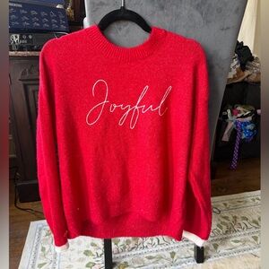 Red knit sweater with white "Joyful" embroidery Size M